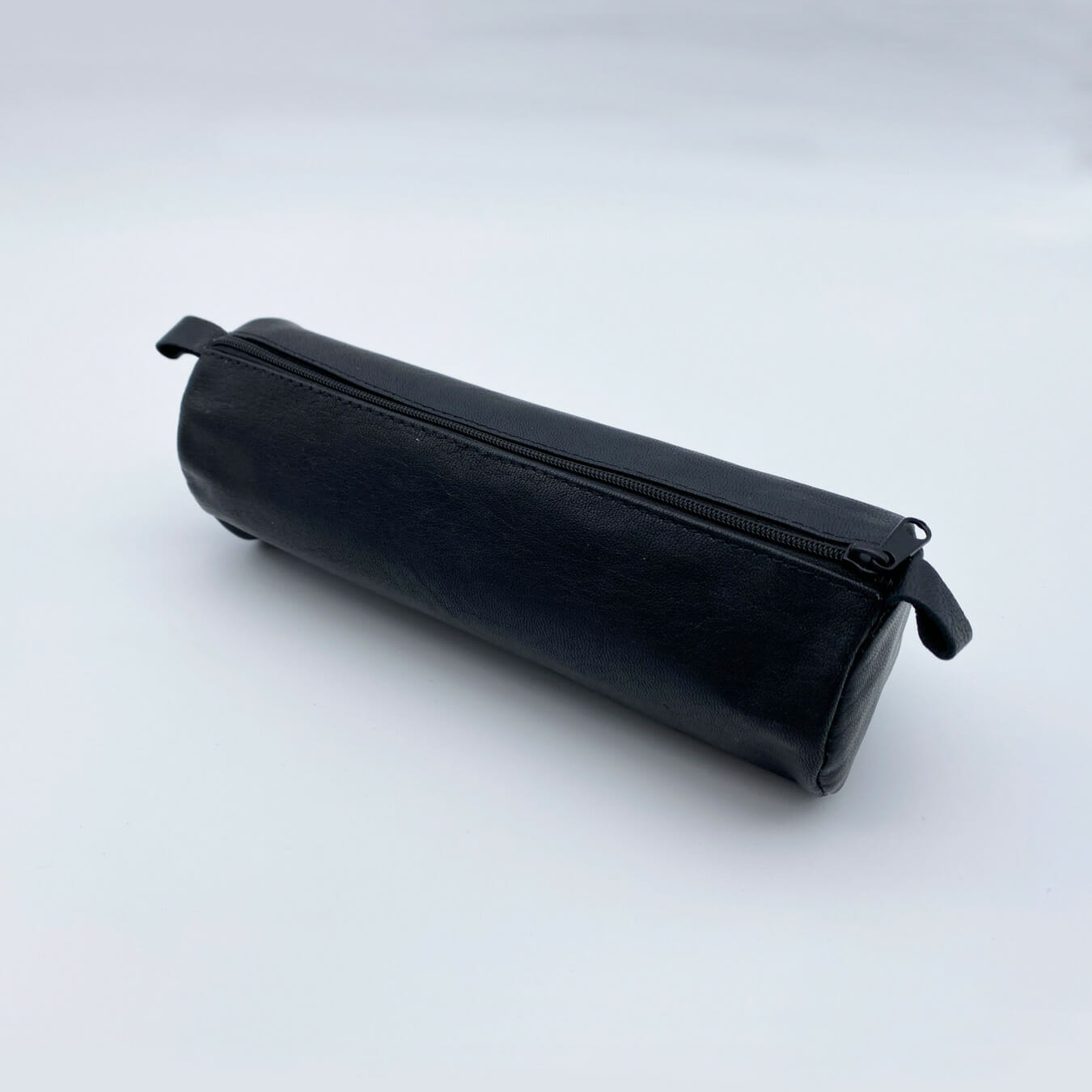 Jüscha Etui rond leder zwart